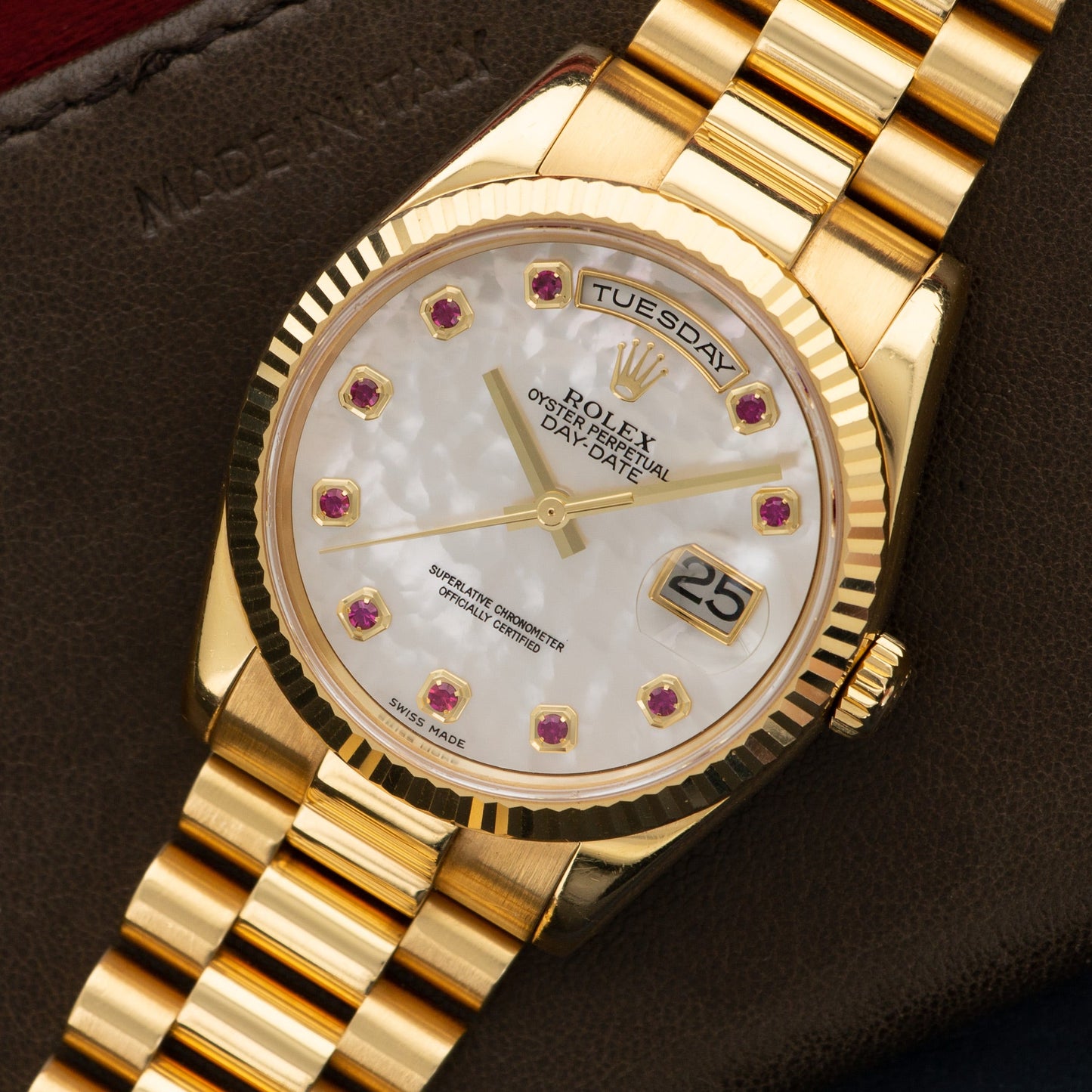 Rolex Yellow Gold Day-Date Mother of Pearl Ruby Watch Ref. 118238