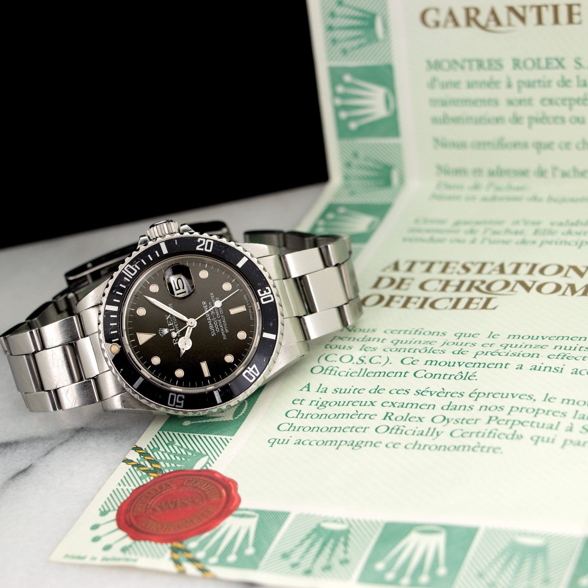 Rolex Steel Submariner Watch Ref. 16800 with Original Warranty Paper