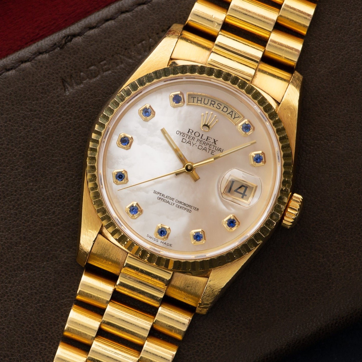 Rolex Yellow Gold Day-Date Mother of Pearl Sapphire Watch Ref. 18238