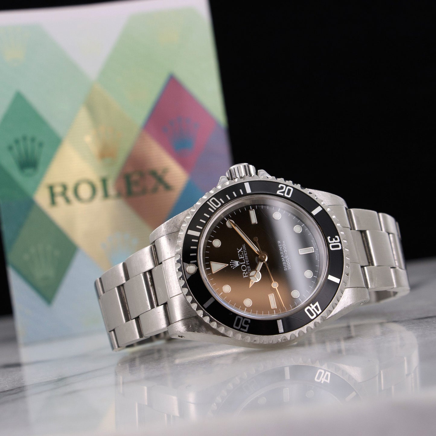 Rolex Submariner Watch Ref. 14060 with Original Warranty Paper