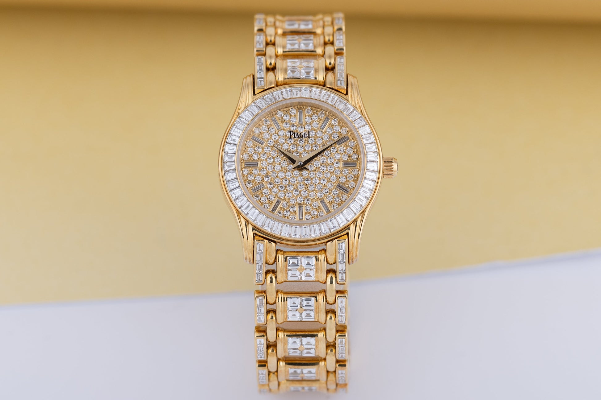 Unworn Piaget Polo Round Ladies Diamond Watch | REF. 22009 M 506 D | 18k Yellow Gold | Pave Diamond Dial with Baguette Diamond Hours | Baguette Diamond Bezel & Bracelet | Circa 2000's