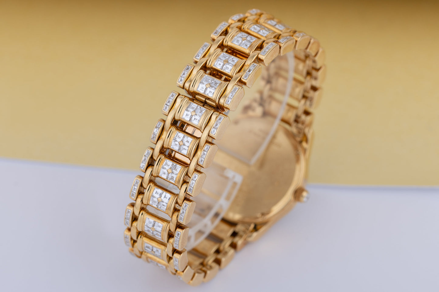 Unworn Piaget Polo Round Ladies Diamond Watch | REF. 22009 M 506 D | 18k Yellow Gold | Pave Diamond Dial with Baguette Diamond Hours | Baguette Diamond Bezel & Bracelet | Circa 2000's