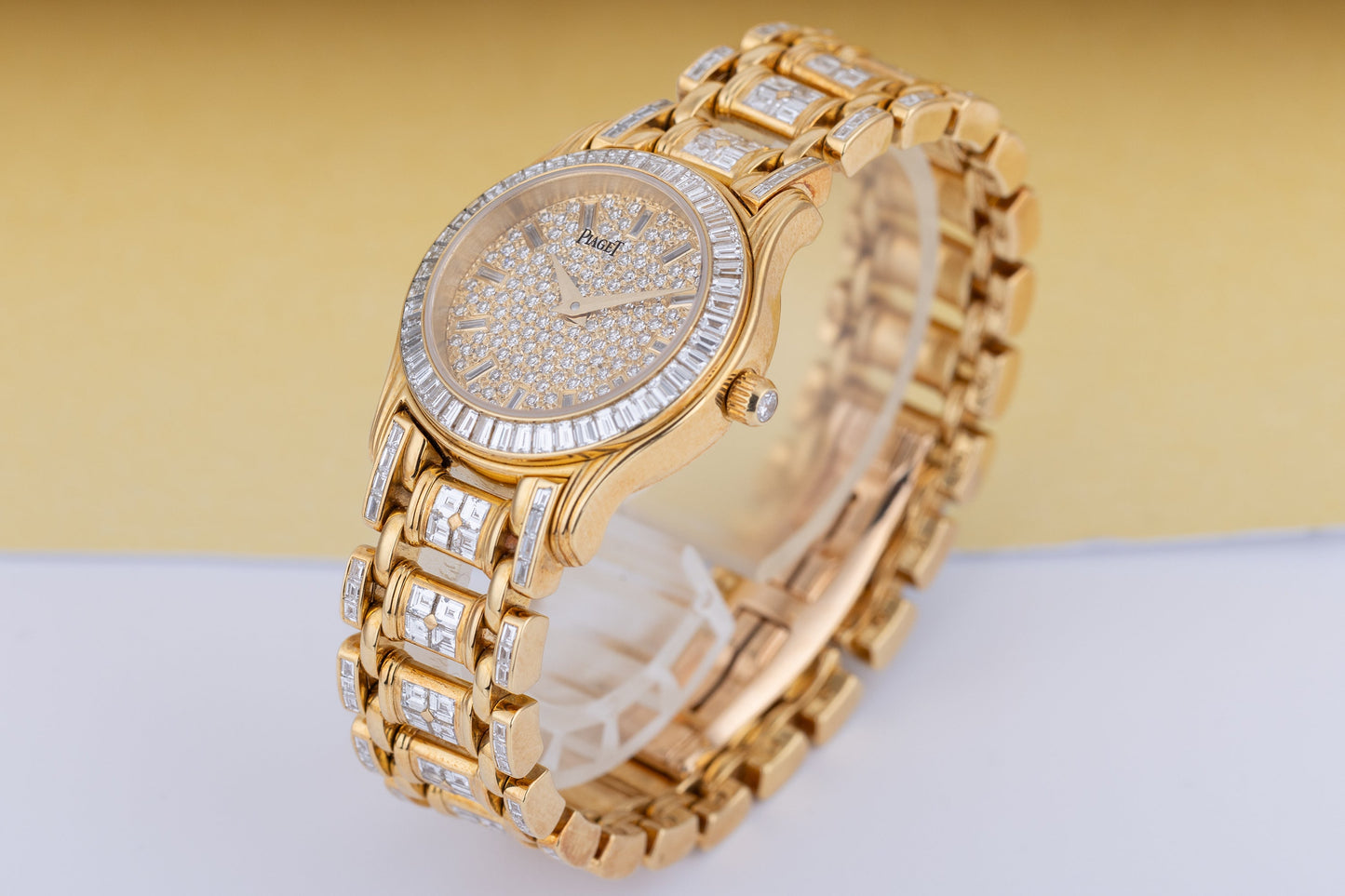 Unworn Piaget Polo Round Ladies Diamond Watch | REF. 22009 M 506 D | 18k Yellow Gold | Pave Diamond Dial with Baguette Diamond Hours | Baguette Diamond Bezel & Bracelet | Circa 2000's