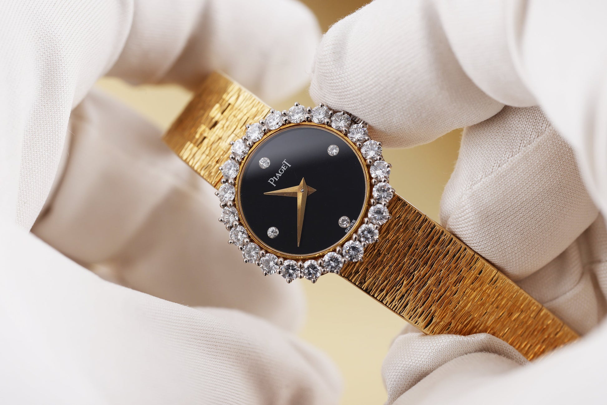 Unworn New Old Stock 1980's: Piaget Vintage Lady Wristwatch | REF. 4171 A 6 | Onyx Diamond Dial | 23mm | Diamond Bezel | 18k Yellow Gold | 1980's