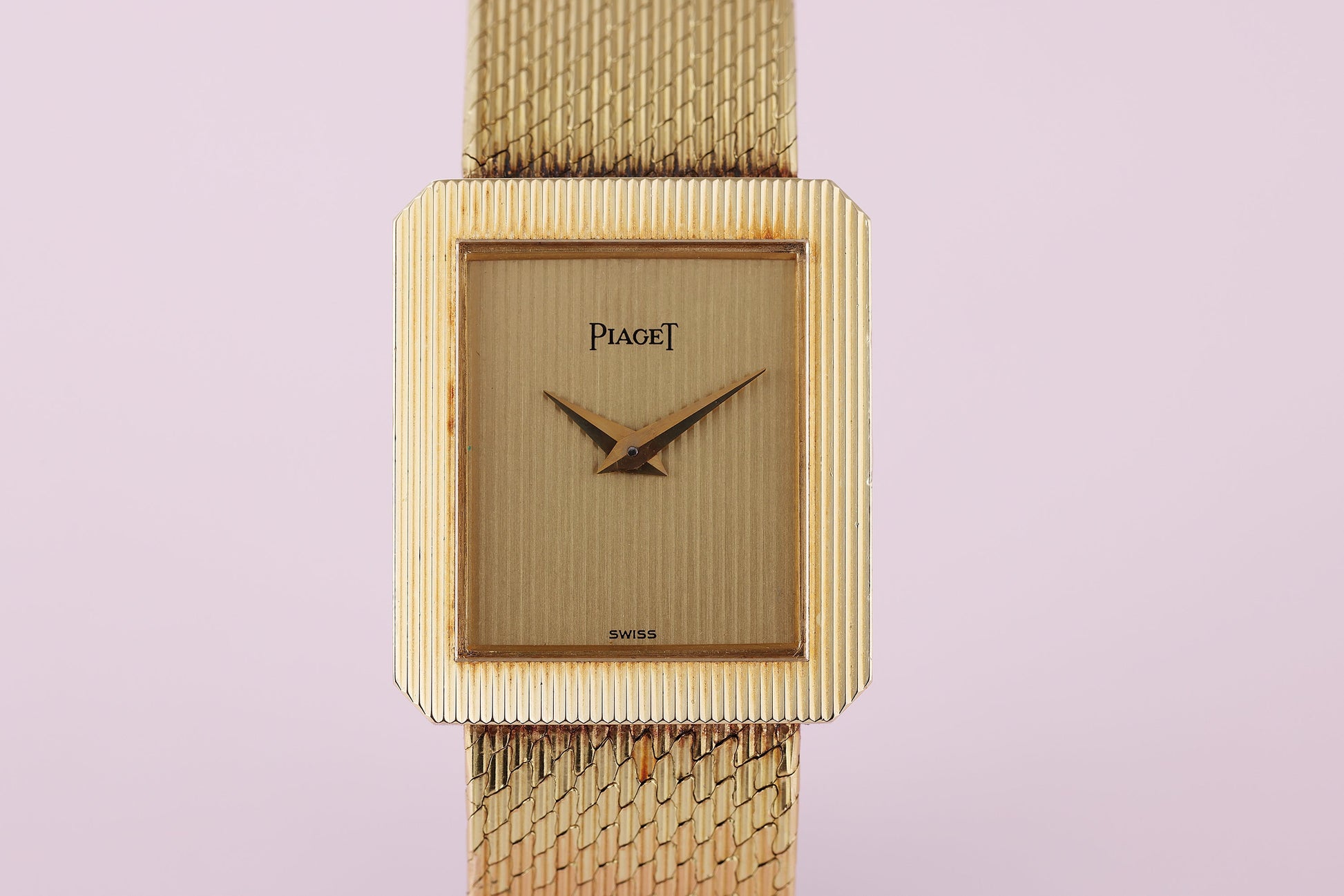 Unworn Piaget Vintage Ladies Wristwatch | REF. 4154 B 12 | Gold Vertically Lined Dial & Bezel | 20mm | 18k Yellow Gold | Manual Wind | 1981