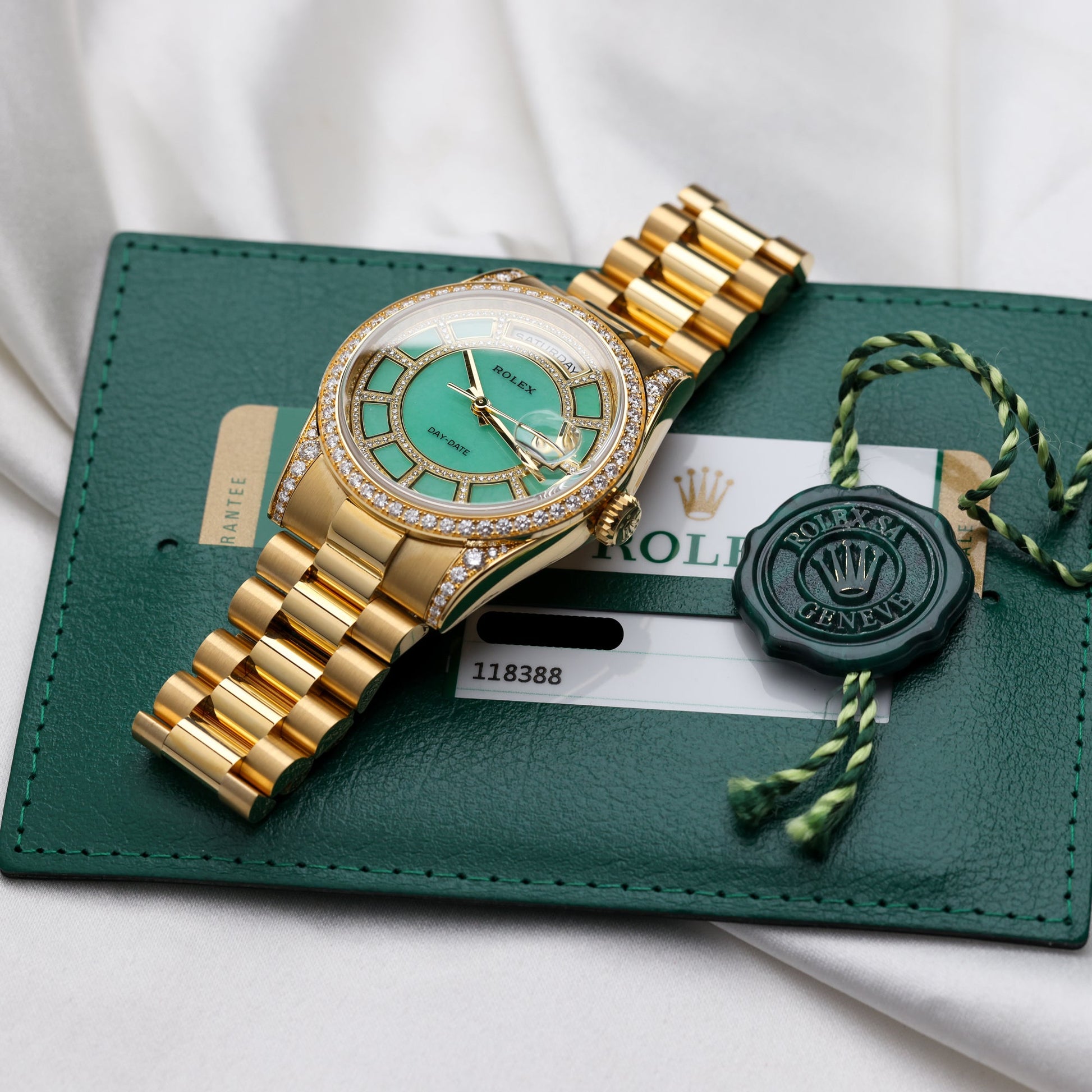 Unworn Rolex Day-Date Carousel | Green Jade Dial | 118388 | Diamond Dial, Bezel & Shoulders | 18k Yellow Gold