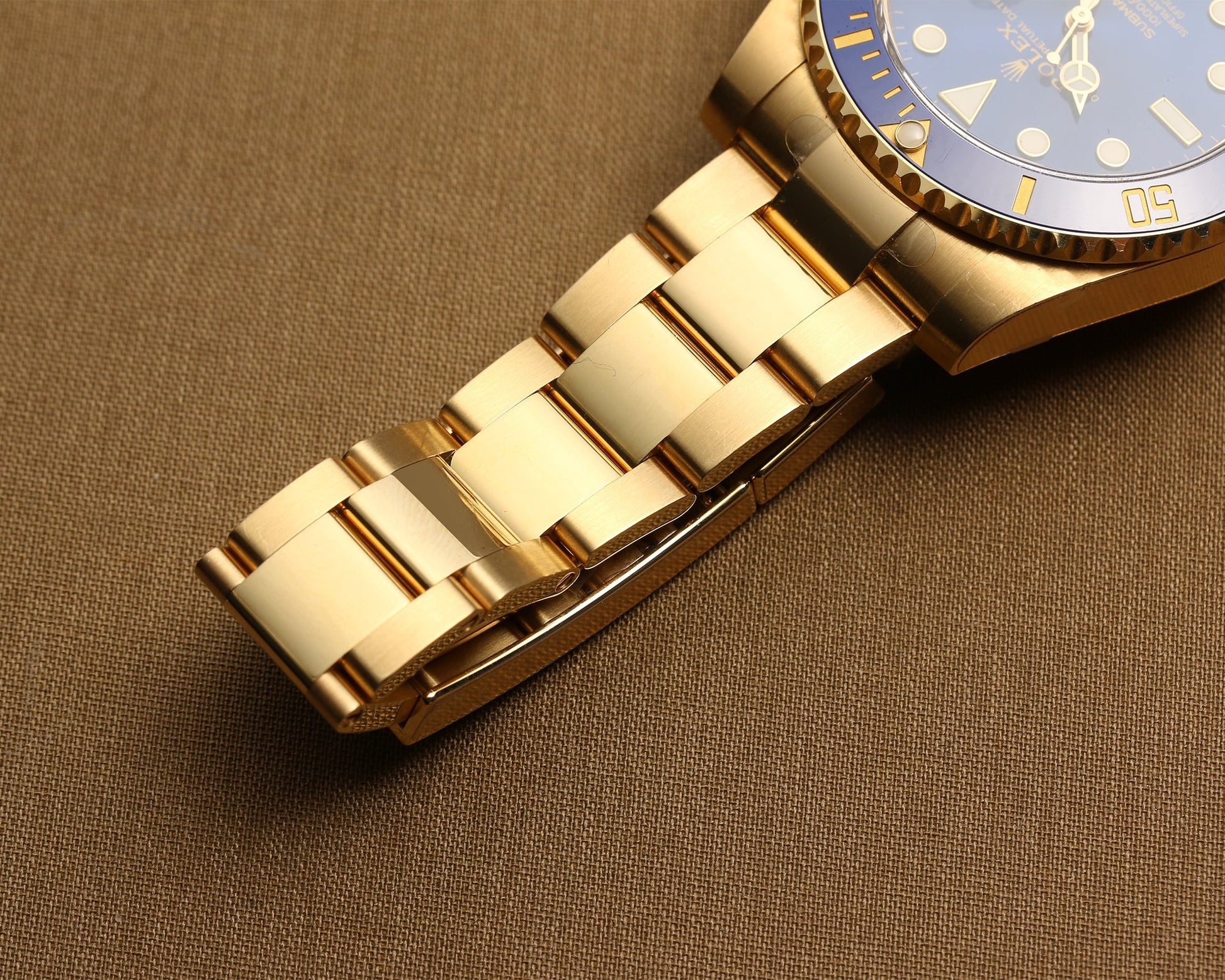 Unworn Rolex Submariner 116618LB 18K Yellow Gold Blue dial