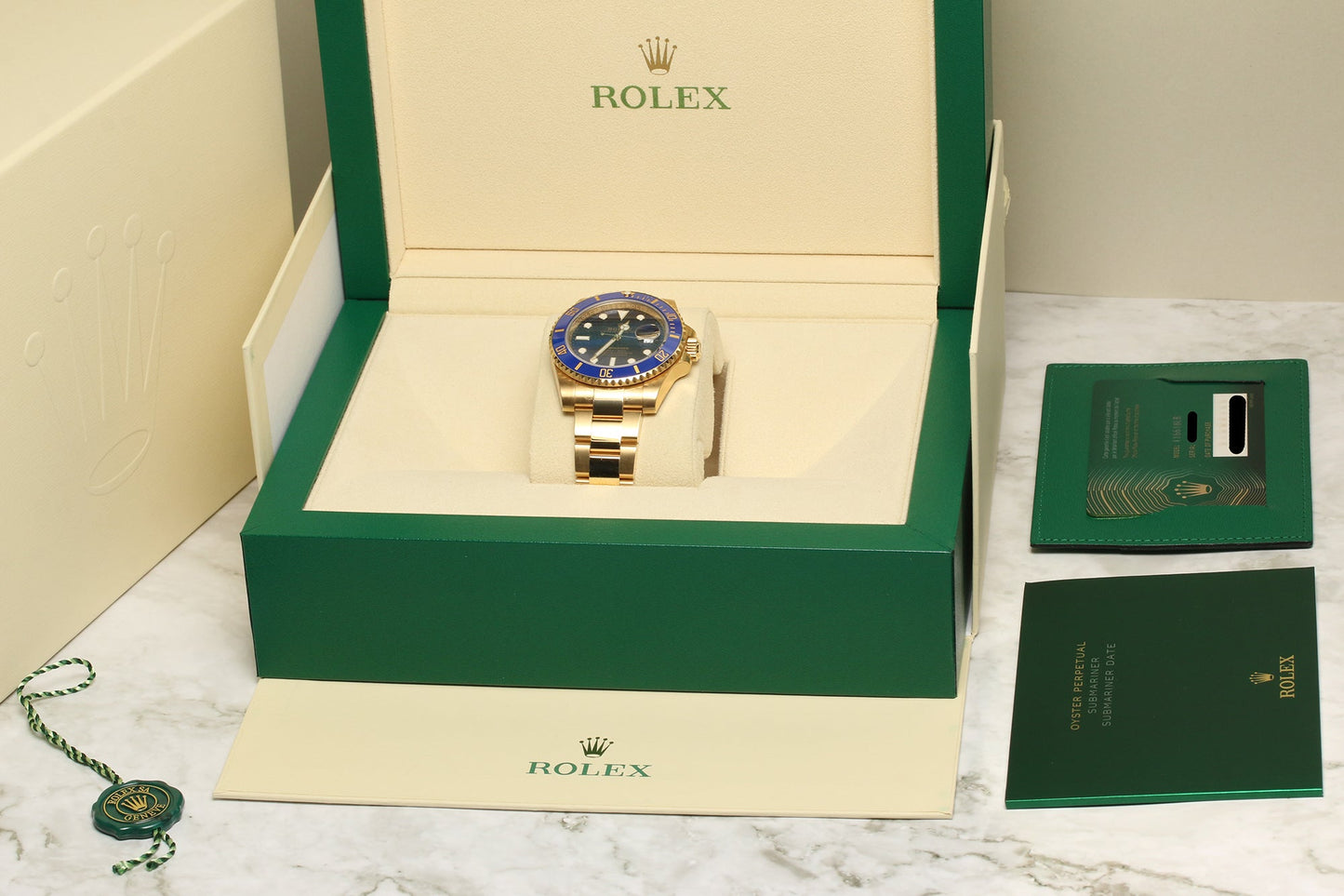 Unworn Rolex Submariner 116618LB 18K Yellow Gold Blue dial