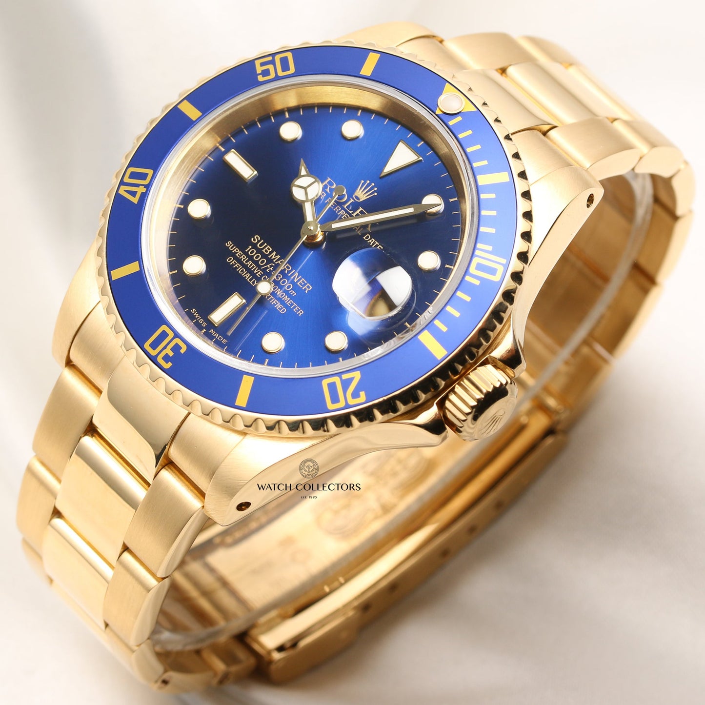 Rolex Submariner 16618 Blue Dial 18k Yellow Gold