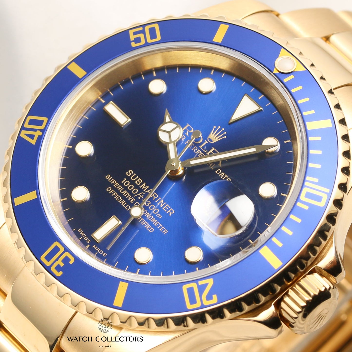 Rolex Submariner 16618 Blue Dial 18k Yellow Gold