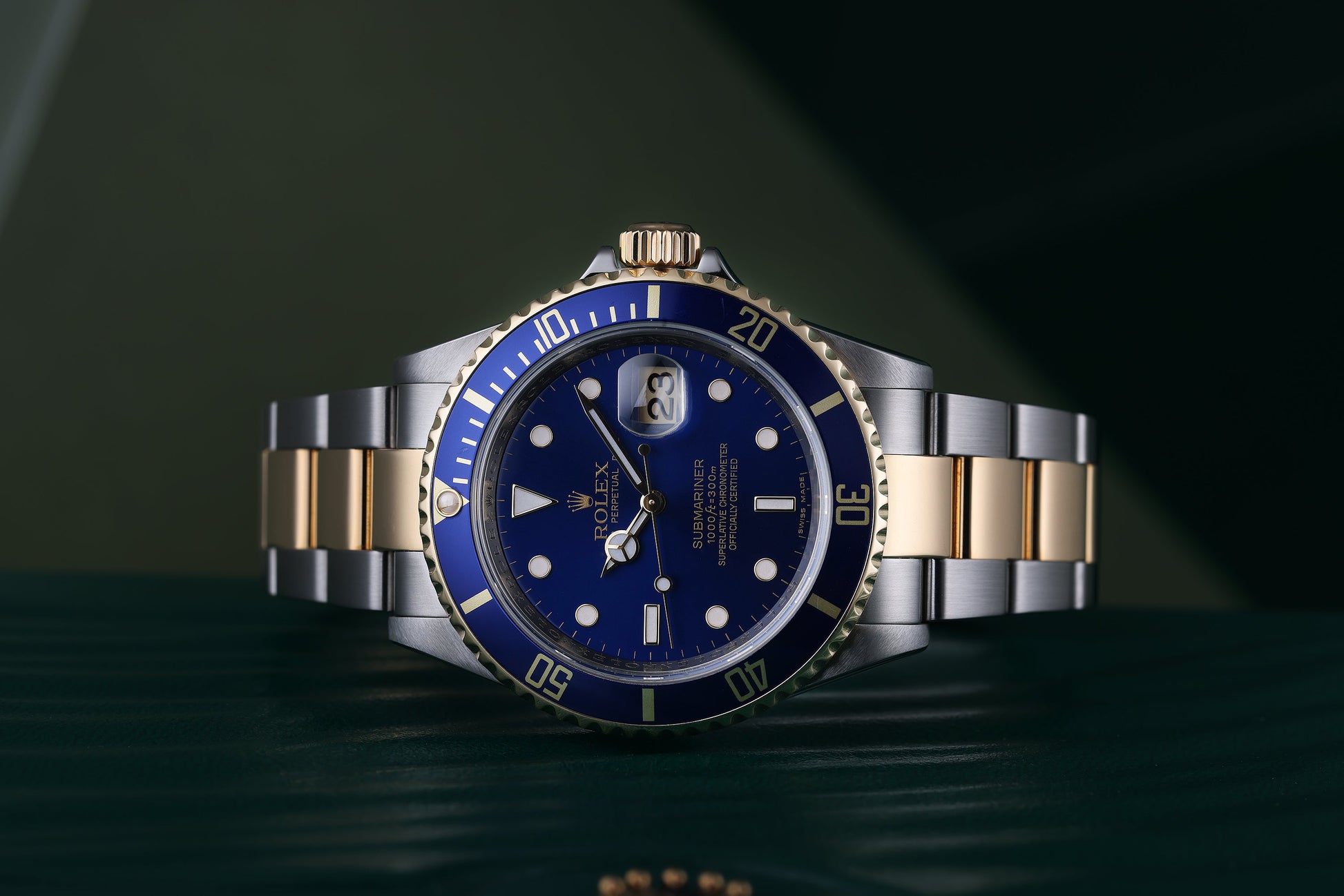 Rolex Submariner | REF. 16613 | Engraved Rehaut | Blue Dial | Box & Papers | 2009 | Stainless Steel & 18k Yellow Gold