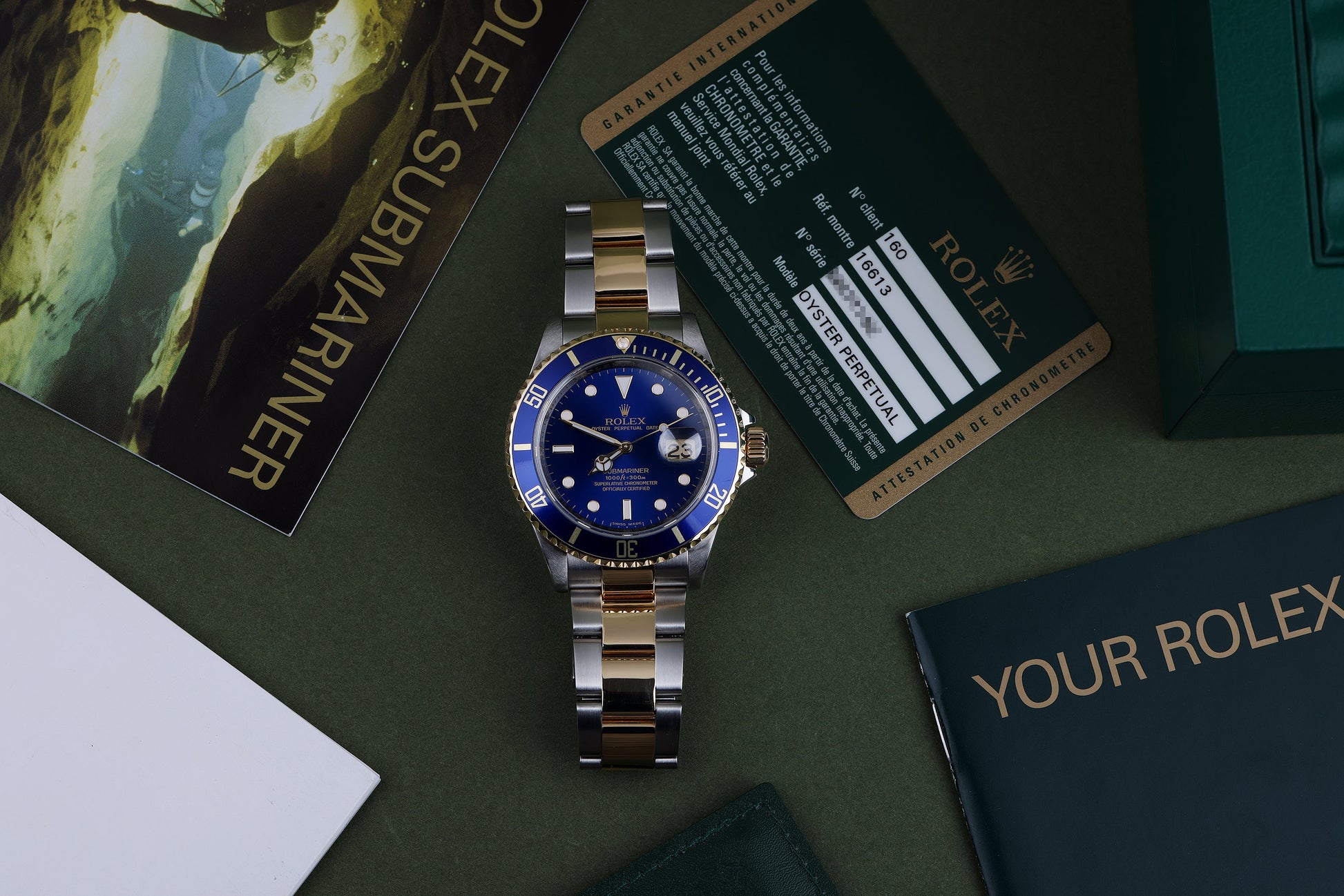 Rolex Submariner | REF. 16613 | Engraved Rehaut | Blue Dial | Box & Papers | 2009 | Stainless Steel & 18k Yellow Gold