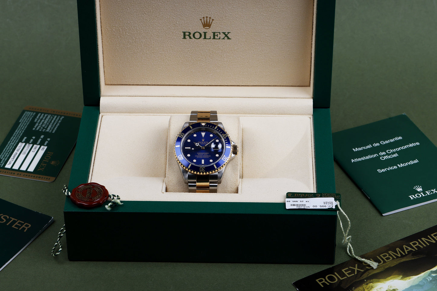 Rolex Submariner | REF. 16613 | Engraved Rehaut | Blue Dial | Box & Papers | 2009 | Stainless Steel & 18k Yellow Gold