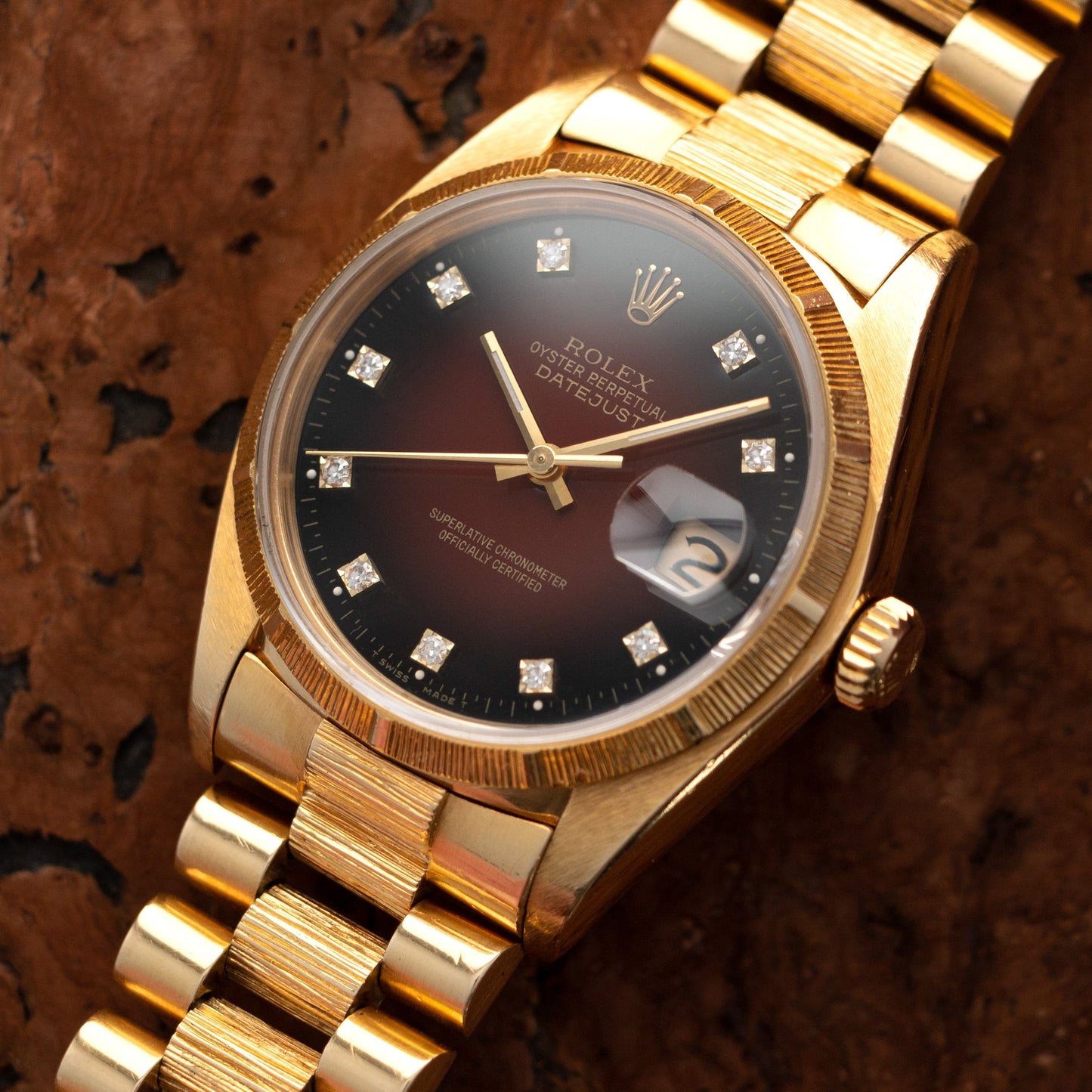 Rolex Yellow Gold Day-Date Ref. 16078 with Red Vignette Dial